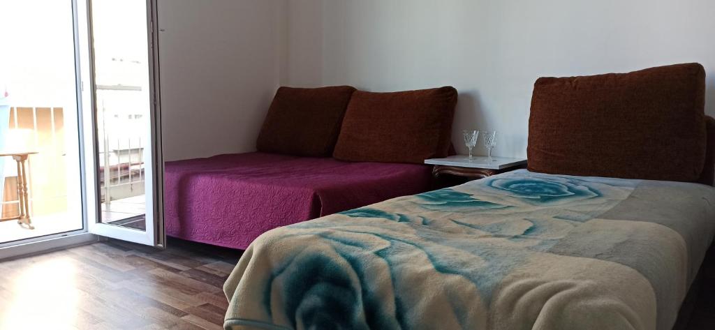 Postel nebo postele na pokoji v ubytování Apartment Center Piraeus location Kastella Passalimani Port