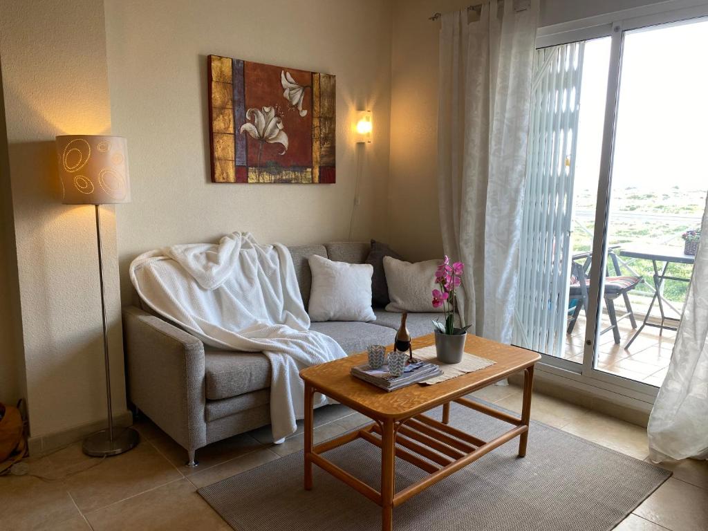 Posedenie v ubytovaní Roof terrace apartment with pool, bikes included