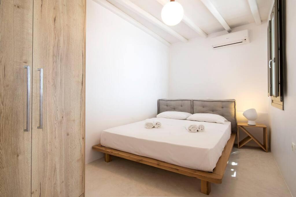 Ένα ή περισσότερα κρεβάτια σε δωμάτιο στο Dreamy Cycladic Summer House 3