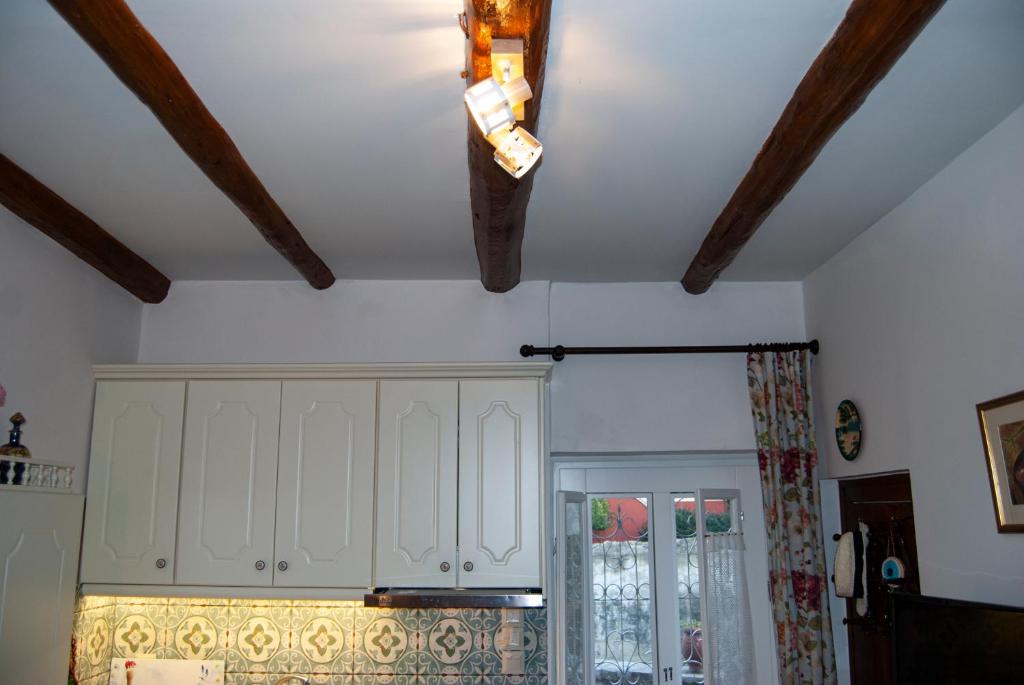 A kitchen or kitchenette at Yangos traditional home