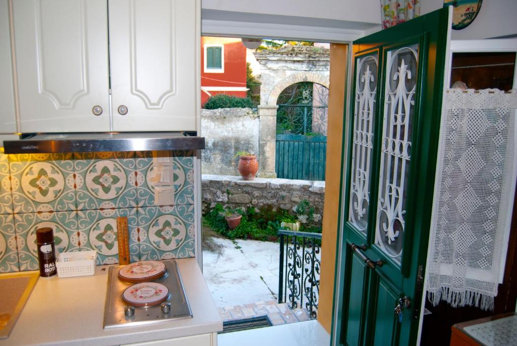 A kitchen or kitchenette at Yangos traditional home
