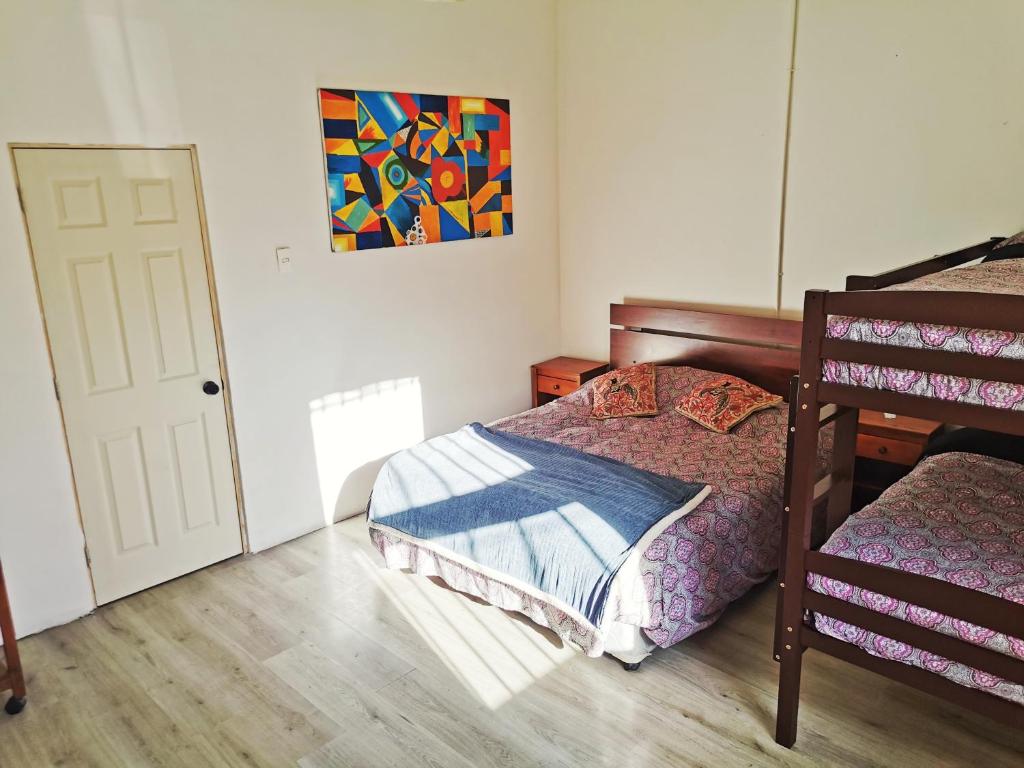 Postel nebo postele na pokoji v ubytování La Casa Piola