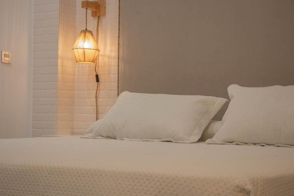 Posteľ alebo postele v izbe v ubytovaní LOFT GARRUCHA CENTER
