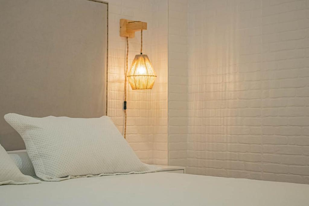 Posteľ alebo postele v izbe v ubytovaní LOFT GARRUCHA CENTER
