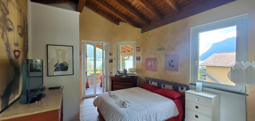TV a/nebo společenská místnost v ubytování APP Spiaggia Bianca