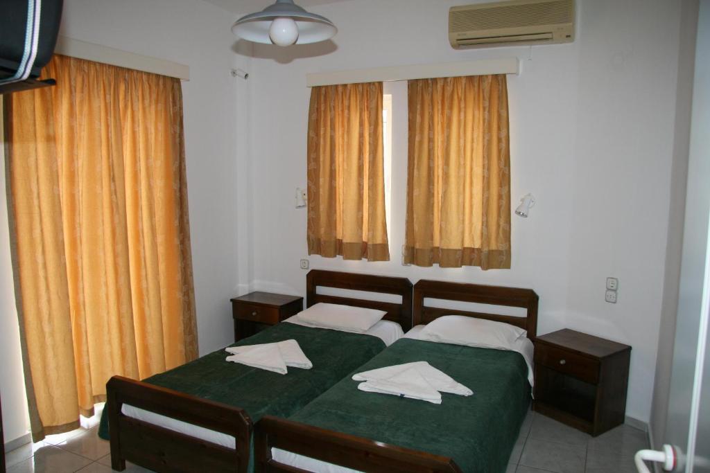 Postel nebo postele na pokoji v ubytování Litsa Mare Apartments