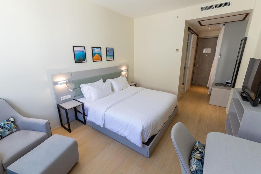Letto o letti in una camera di Elements Hotel & Shops Curaçao