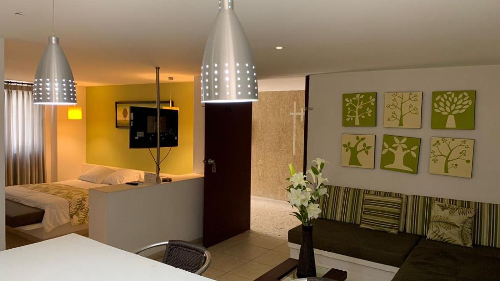 Uma cama ou camas num quarto em Vallclaire Suites