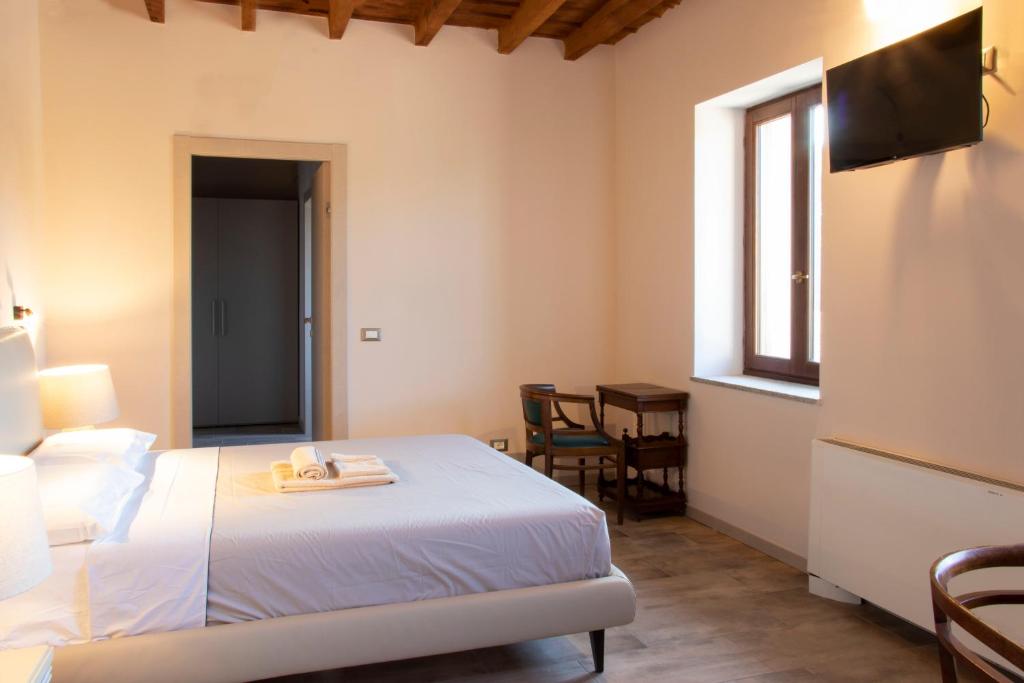 Postel nebo postele na pokoji v ubytování Mahthildis Agriturismo B&B