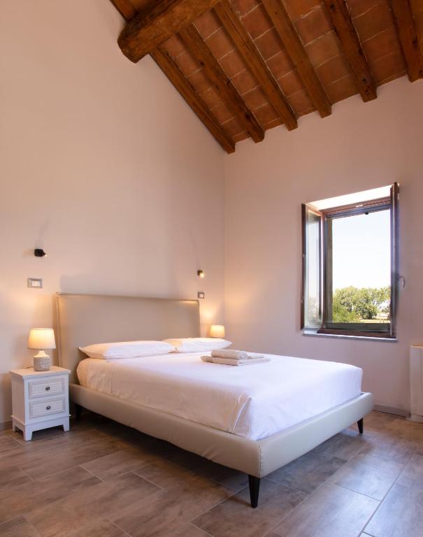 Postel nebo postele na pokoji v ubytování Mahthildis Agriturismo B&B