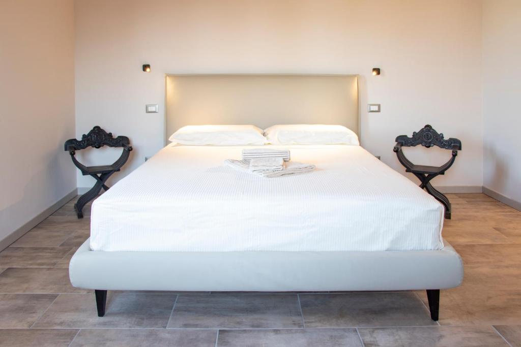 Postel nebo postele na pokoji v ubytování Mahthildis Agriturismo B&B