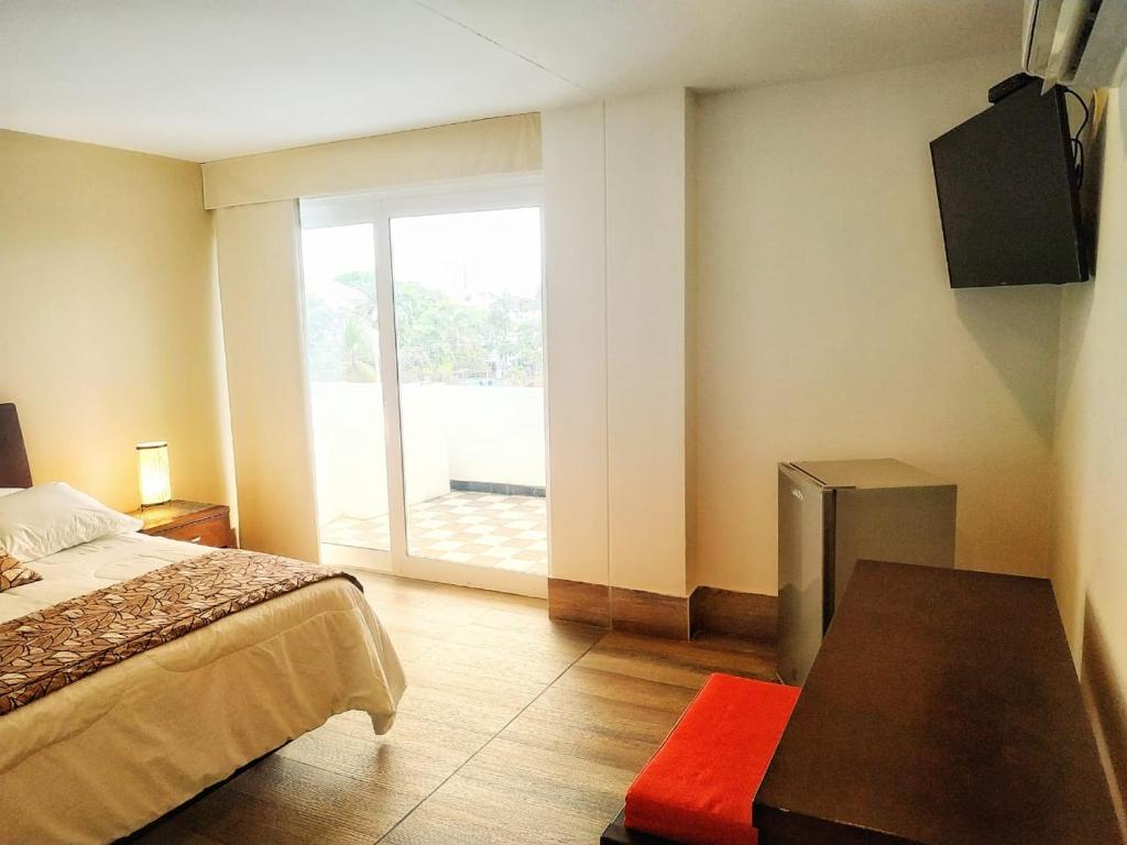 Uma cama ou camas num quarto em Vallclaire Suites