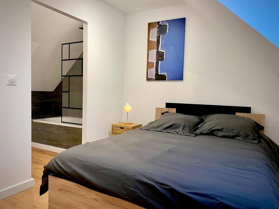 Posteľ alebo postele v izbe v ubytovaní Appartement rénové proche Gare