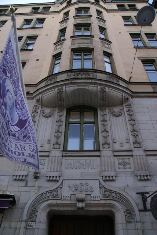 a building with a sign on the side of it at Hotel Hornsgatan in Stockholm