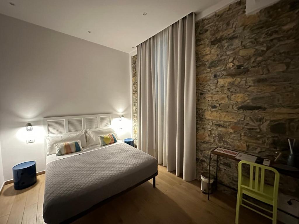 Postel nebo postele na pokoji v ubytování A Ca' De Mananan Guesthouse