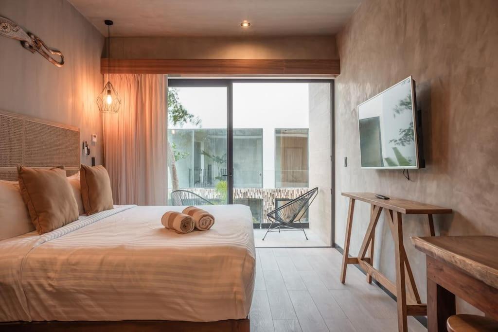 Postel nebo postele na pokoji v ubytování Estudio l Concierge privado, perfecta ubicación