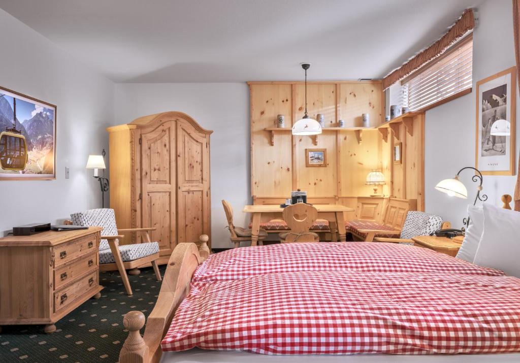 Postel nebo postele na pokoji v ubytování Hotel Pension Anna