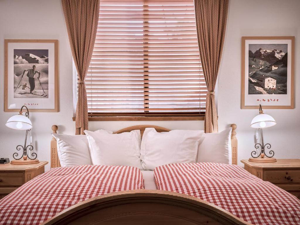 Postel nebo postele na pokoji v ubytování Hotel Pension Anna