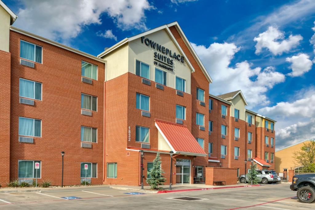 an image of a hotel with a building at TownePlace Suites by Marriott Dallas McKinney in McKinney