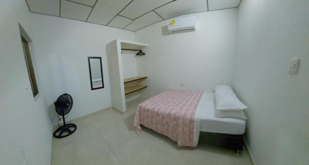 Postel nebo postele na pokoji v ubytování Guio Apartamentos