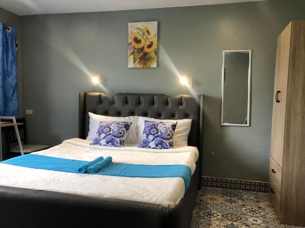 Postel nebo postele na pokoji v ubytování D Sanctum Resort
