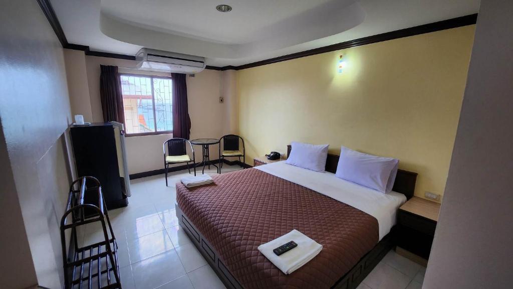 Postel nebo postele na pokoji v ubytování White Rose​ Hotel​ II​