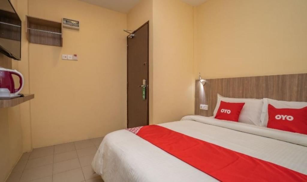 Postel nebo postele na pokoji v ubytování Hotel The Island