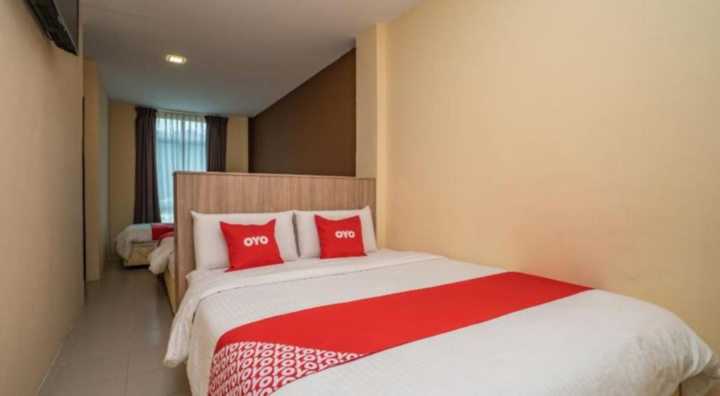 Postel nebo postele na pokoji v ubytování Hotel The Island