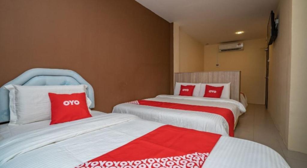 Postel nebo postele na pokoji v ubytování Hotel The Island