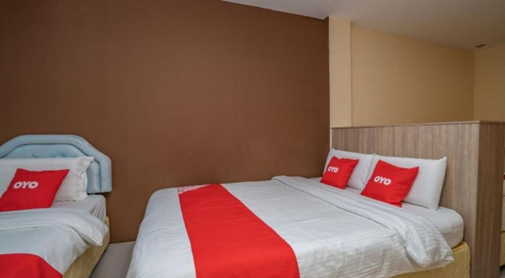 Postel nebo postele na pokoji v ubytování Hotel The Island