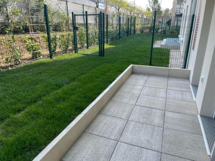 Vonkajšia záhrada v ubytovaní Le Plessis Capitale - Appartement entier avec jardin