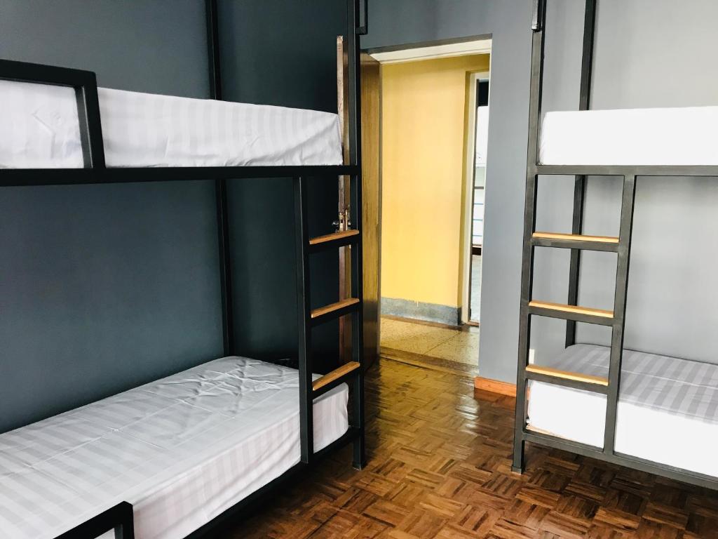 Postel nebo postele na pokoji v ubytování Alobar1000 Hostel