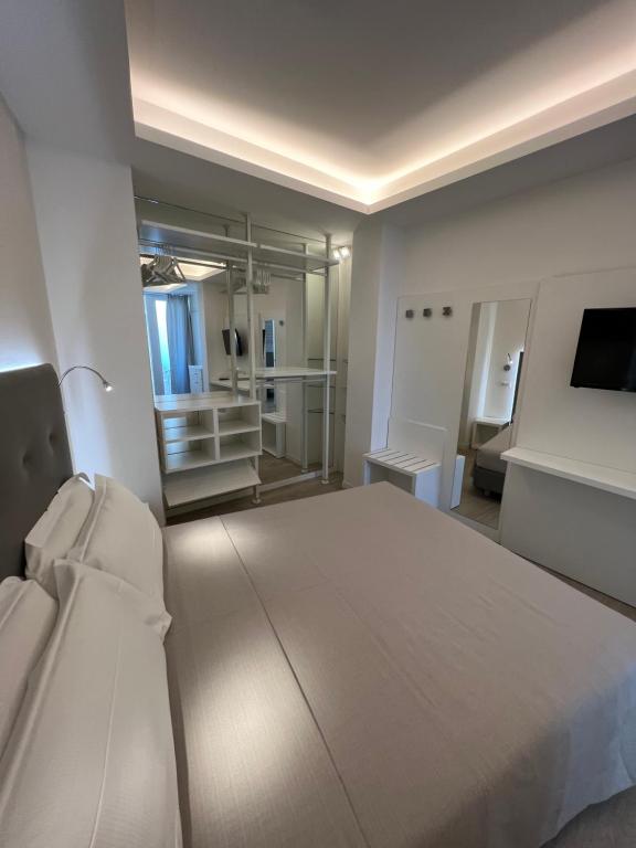 Postel nebo postele na pokoji v ubytování Hotel Ardea