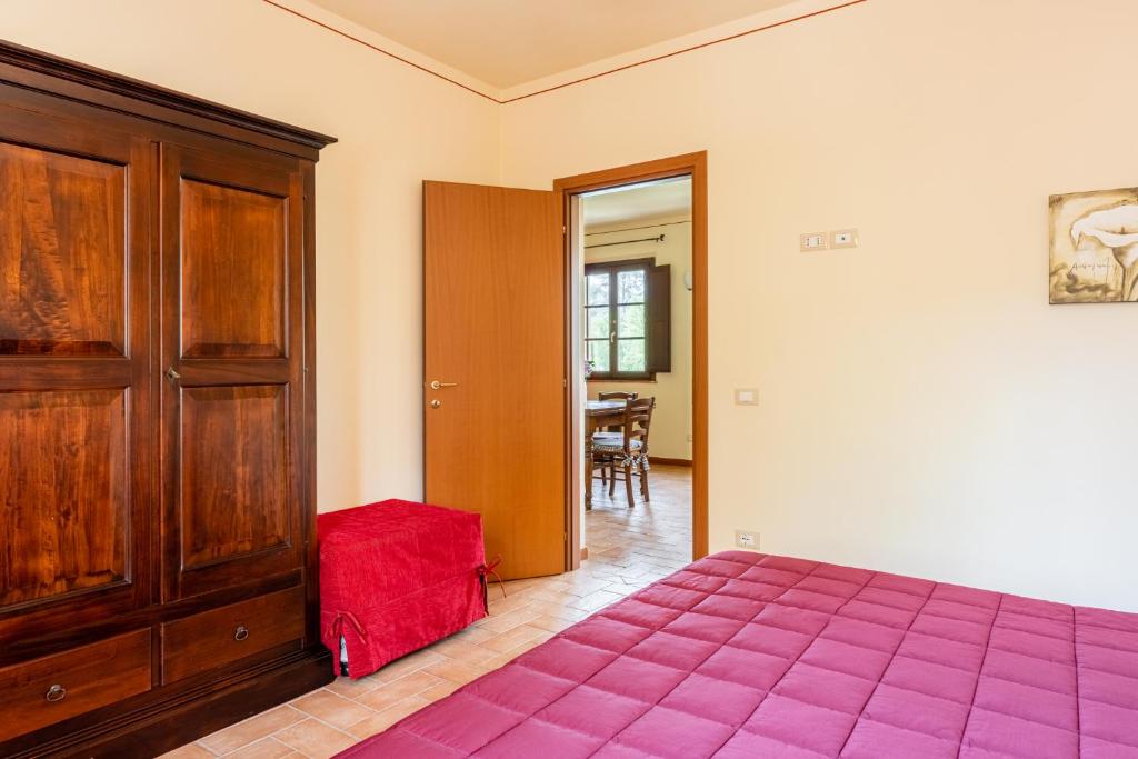 Postel nebo postele na pokoji v ubytování Casolare dei Fiori - Calla