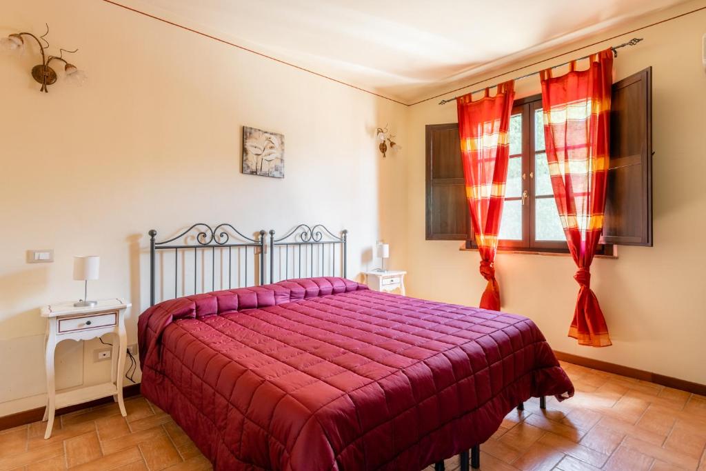 Postel nebo postele na pokoji v ubytování Casolare dei Fiori - Calla