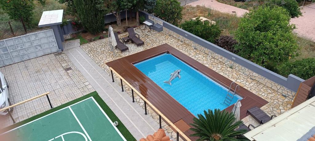 Bazén v ubytování Local Paradise Xilokastro nebo v jeho okolí