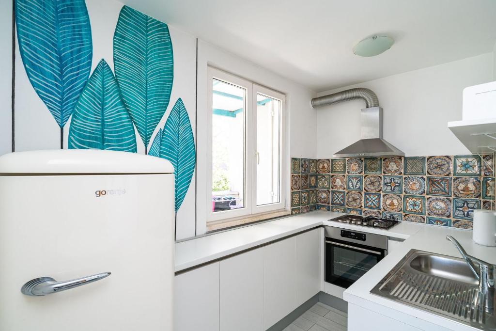 Kuchyňa alebo kuchynka v ubytovaní Apartment Radovan