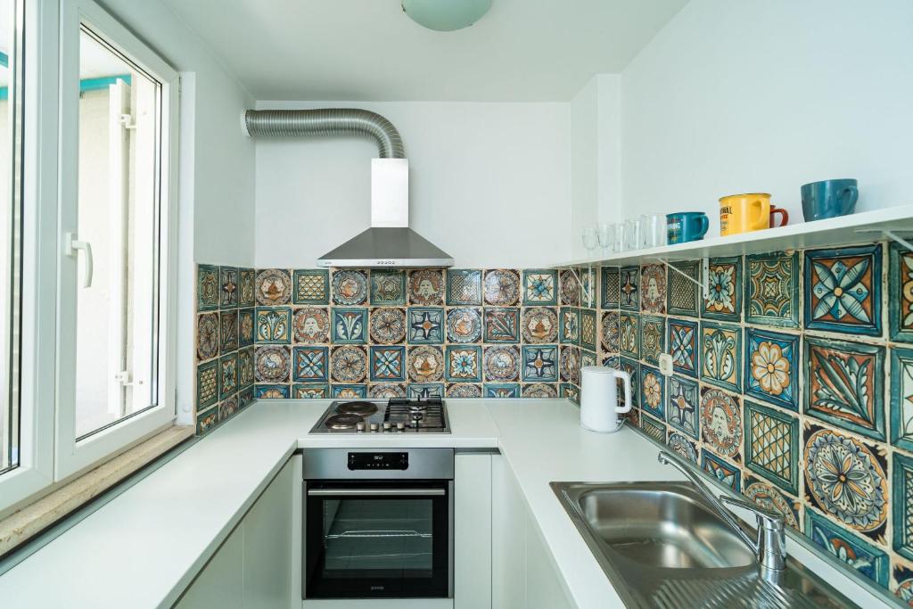 Kuchyňa alebo kuchynka v ubytovaní Apartment Radovan