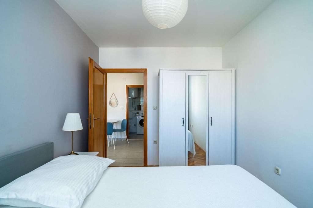 Posteľ alebo postele v izbe v ubytovaní Apartment Radovan
