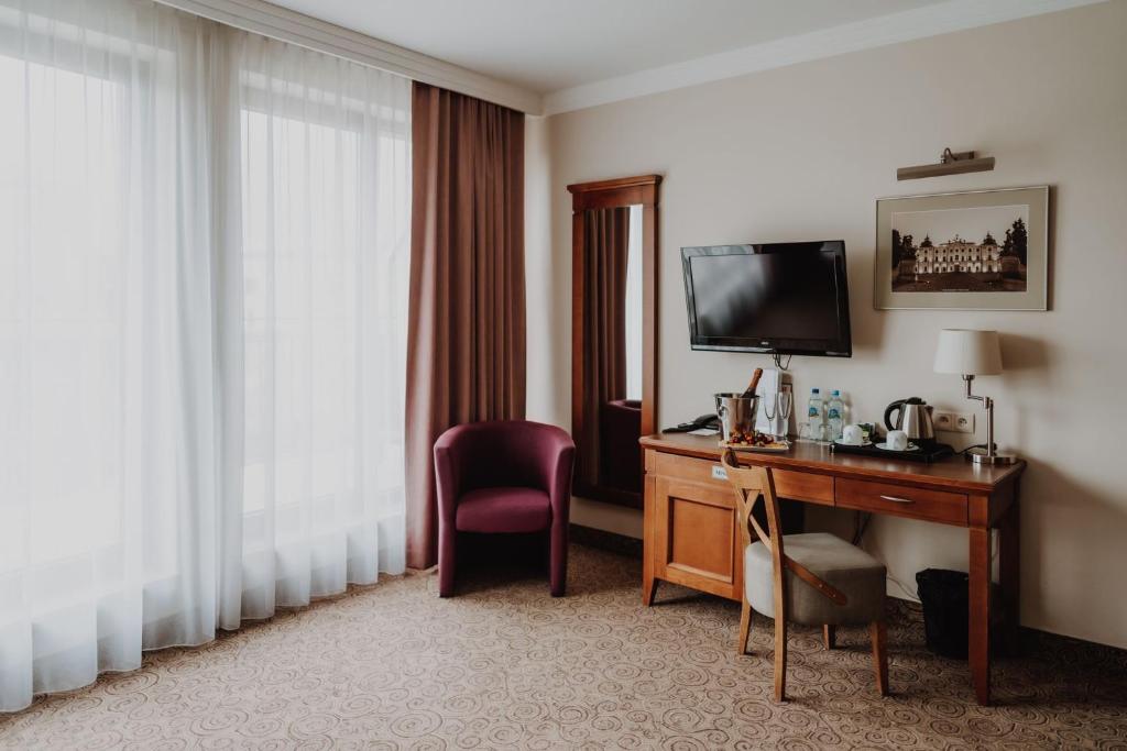 TV a/nebo společenská místnost v ubytování Hotel Esperanto