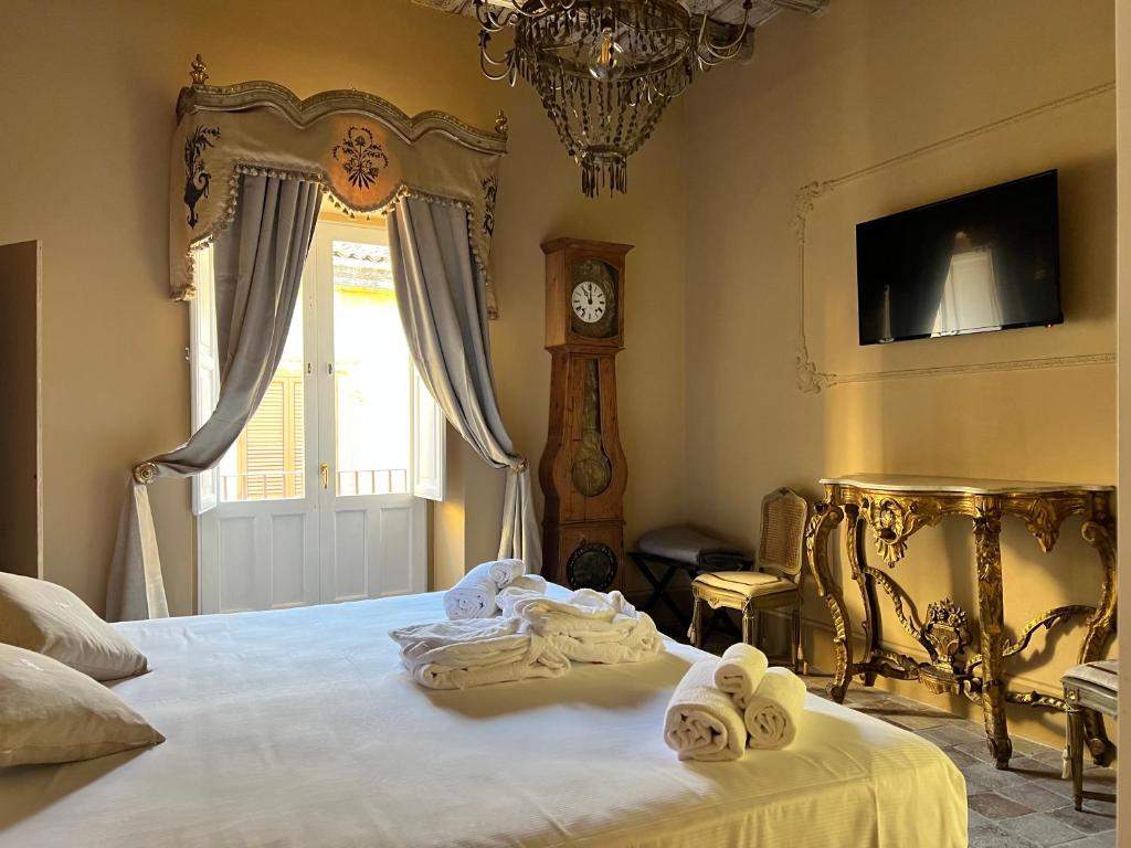 Postel nebo postele na pokoji v ubytování Casa Modica - Luxury rooms