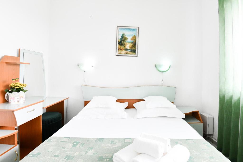 Postel nebo postele na pokoji v ubytování COMPLEX TISMANA 3* ALL INCLUSIVE