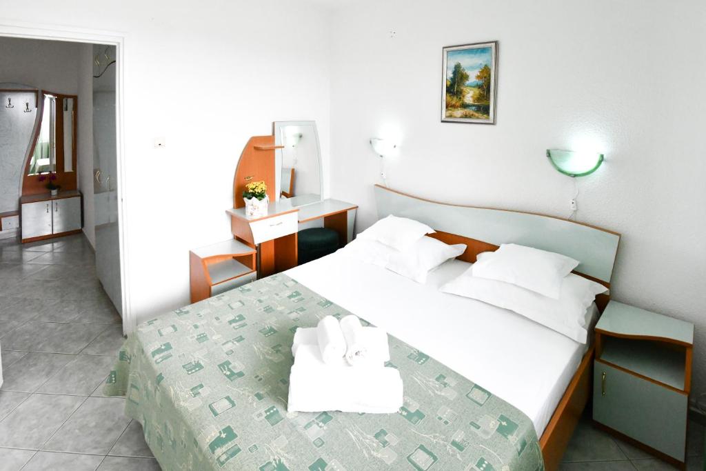 Postel nebo postele na pokoji v ubytování COMPLEX TISMANA 3* ALL INCLUSIVE