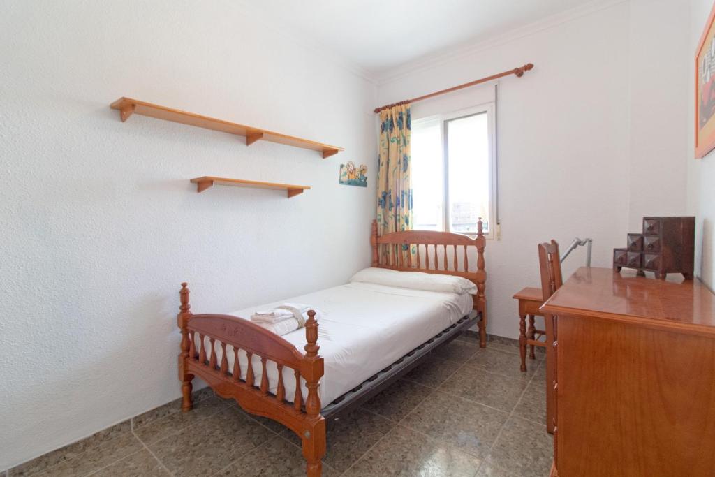 Postel nebo postele na pokoji v ubytování Global Properties, Apartamento con terraza y piscina a un paso de la playa