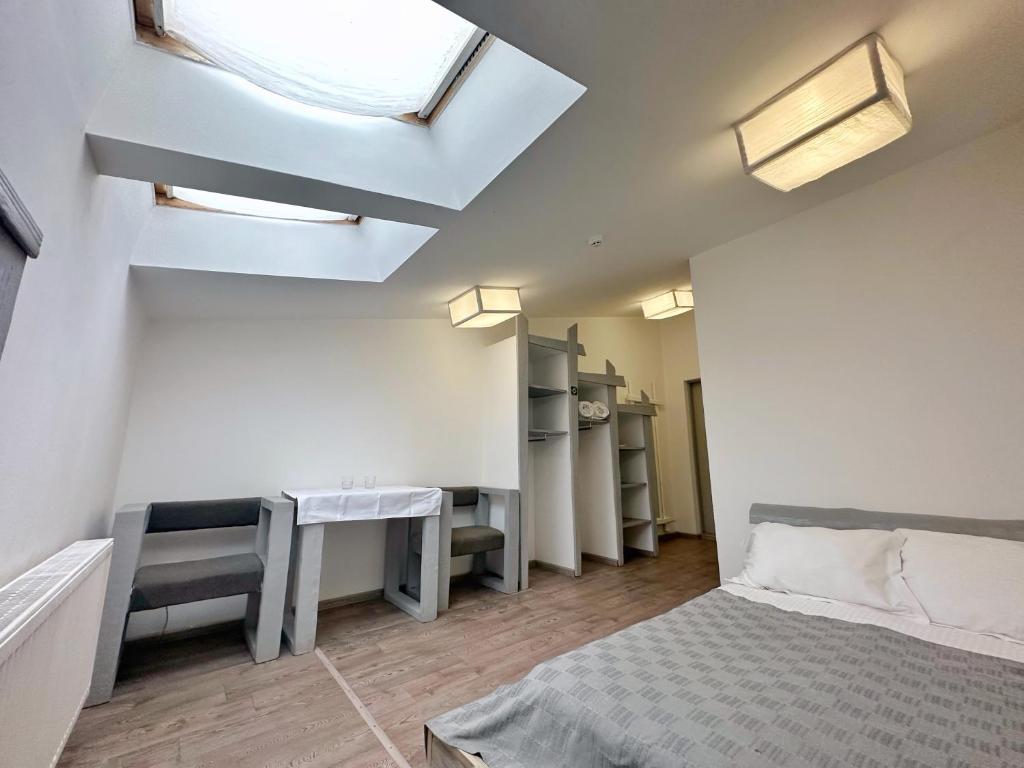 Postel nebo postele na pokoji v ubytování Higina Spa Hotel