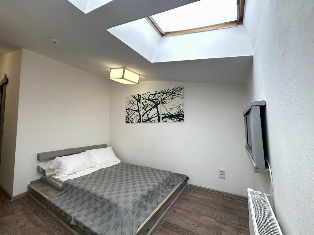 Postel nebo postele na pokoji v ubytování Higina Spa Hotel