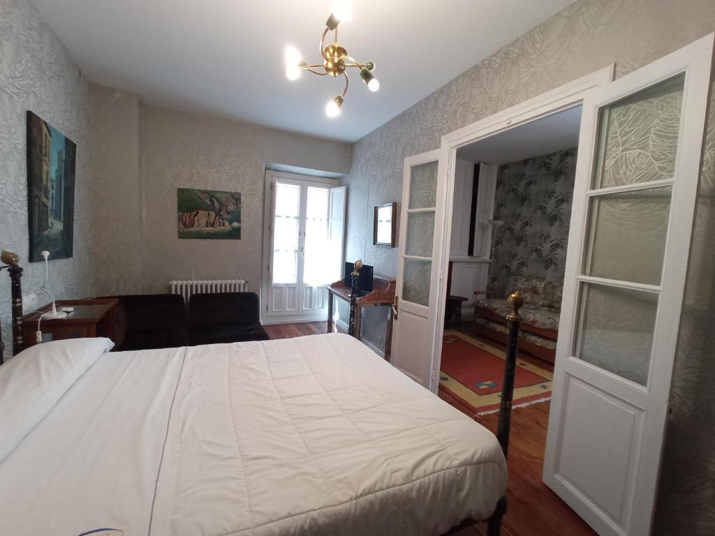 Postel nebo postele na pokoji v ubytování Hotel Ormazabal