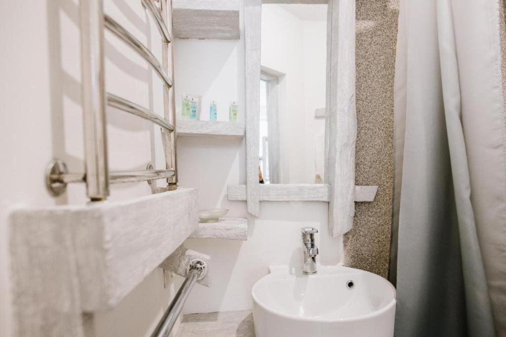 Koupelna v ubytování Higina Spa Hotel