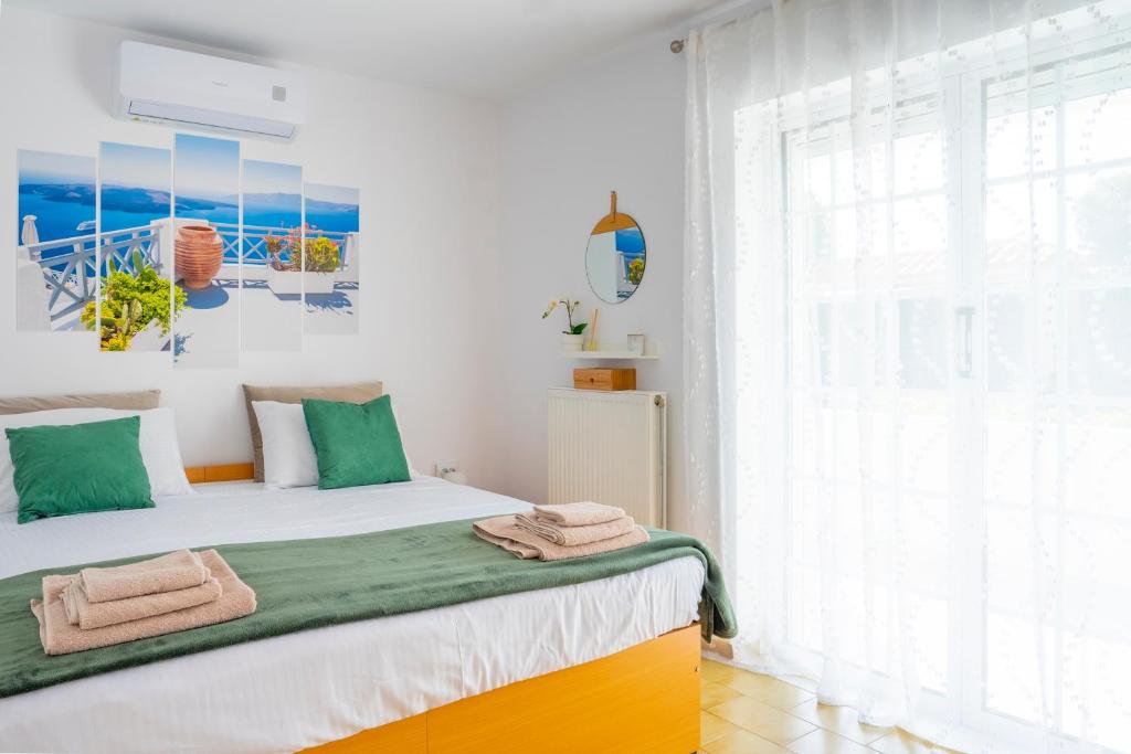 Postel nebo postele na pokoji v ubytování New Olivka House