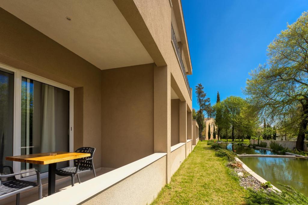 Vonkajšia záhrada v ubytovaní Folies Corfu Town Hotel Apartments